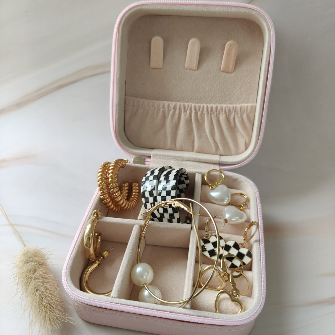 Rakhi Radiance Hamper- A Combination of 4 Earrings and 1 Necklace in a Jewelry Box.