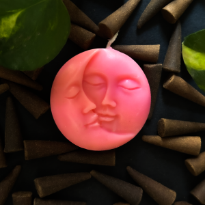 The Dual Moon Face Candle